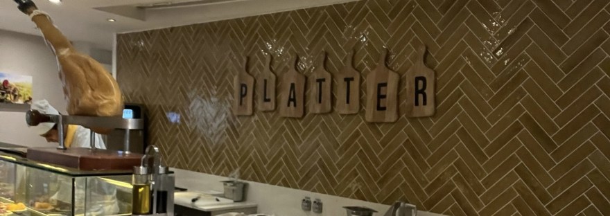 The Platter sign attached the the wall identifying the restaurant onboard. Marella Voyager