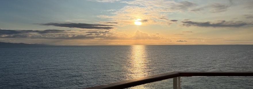 A sunset view from a cruise ship balcony